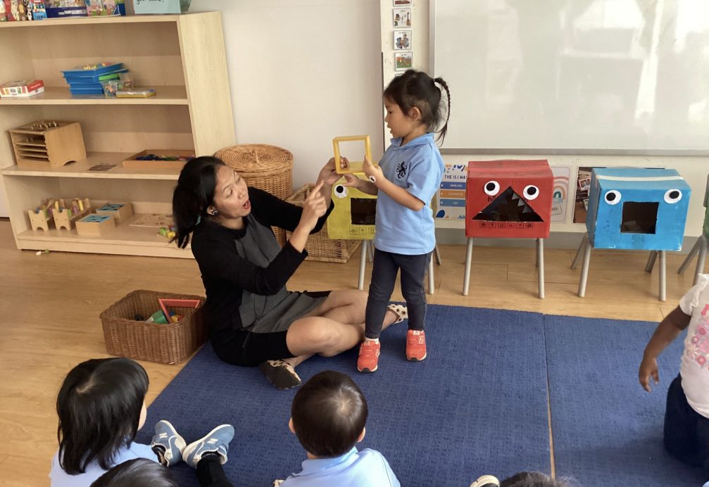 Young children playing with wooden toys in the ISJ early years setting